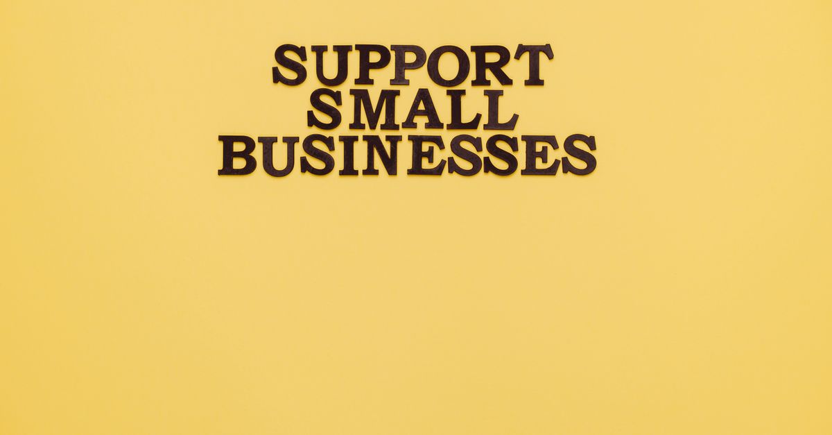 Inspirational image with 'Support Small Businesses' text on a warm yellow background.